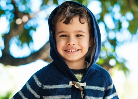 young boy smiling